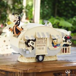 Embárcate en una nostálgica aventura con la encantadora figura de Mickey Mouse y sus amigos en una caravana vintage. Con unas medidas de 18,4 cm de largo, 9,8 cm de ancho y 12,4 cm de alto