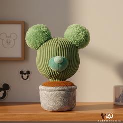 Un soplo de verdor animado invade tu espacio con esta original figura de 20 cm que fusiona la silueta de Mickey con la ternura de una planta en maceta. Confeccionada en suave pana acanalada para el cuerpo 