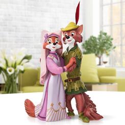 Adéntrate en el mundo mágico de Disney con la deslumbrante figura de Robin Hood y Maid Marian. Esta impresionante figura Showcase es un homenaje a la belleza y la elegancia de estos personajes clásicos.