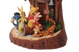 06-figura-pooh-tallada-con-el-corazon.jpg