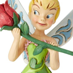 Preciosa figura de Campanilla con una rosa con una altura aproximada de 16 cm., disfruta del hada más famosa de la factoría Disney rememorando una de las escenas de la película de Peter Pan. 