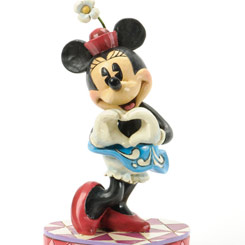 Romántica figura de Minnie Mouse haciendo un corazoncito con las manos, el artista Jim Shore ha elaborado esta figura con unos 17,5 cm., de altura..