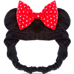 Cinta del pelo para maquillaje de Minnie Mouse basada en el popular personaje de la factoría Disney. Esta preciosa cinta con el emblemático lazo y las orejitas de Minnie está realizada en 100% poliéster. 
