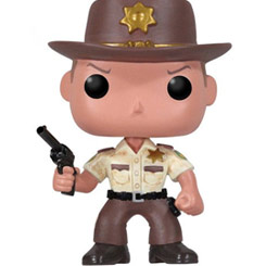 Figura de Rick Grimes realizada en vinilo perteneciente a la línea Pop! de Funko. La figura tiene una altura aproximada de 10 cm., y está basada en la serie de TV The Walking Dead. 