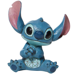 Figura de Stitch Mini basada en la película Lilo & Stitch del año 2002 de Walt Disney. Con esta figura de cerca de 5 cm., de altura se ha mezclado la magia de las figuras de Walt Disney