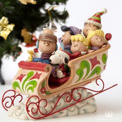 Celebra la temporada navideña con la figura de Navidad de Snoopy y sus amigos, una auténtica joya basada en los queridos cómics de Peanuts de Charles M. Schulz. 