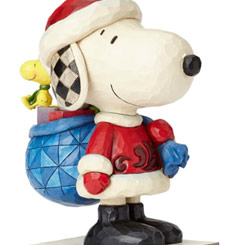 Figura de Snoopy Claus y Woodstock basada en los comics de Penauts de Charles M. Schulz, el artista Jim Shore ha elaborado esta figura con unas dimensiones aproximadas de 26 x 20,5 x 13,5 cm.,