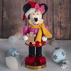 Esta encantadora figura de Minnie Mouse trae el espíritu navideño a tu hogar con un toque único. Inspirada en el icónico personaje de Walt Disney, Minnie aparece sosteniendo una galleta de jengibre 