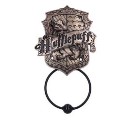 Descubre el mundo mágico con este aldaba de bronce con licencia oficial de Harry Potter Hufflepuff. Con un tejón en el centro de esta pieza que es el animal emblemático de la casa Hufflepuff