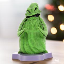 Organiza tus dispositivos con estilo gracias al Mini-Soporte Holdems de Oogie-Boogie. Inspirado en "Pesadilla antes de Navidad", esta figura coleccionable de 10 cm no solo añade un toque de diversión a tu espacio