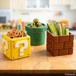 La mesa cambia de energía cuando aparece un set de 3 bowls snack 3D inspirado en el universo del videojuego clásico. Cada pieza reproduce formas reconocibles de pantalla, con volumen real, colores intensos y ese punto nostálgico que convierte un aperitivo