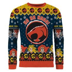 El rugido de Tercera Tierra toma el control de las fiestas con esta sudadera navideña Thundercats de estética retro y colores intensos. El gran emblema felino, acompañado por el llamativo “Ho Ho Hooo!”