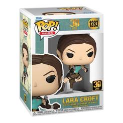 Figura POP 30 Tomb Raider Lara Croft en vinilo con pose dinámica y base transparente. Presentada en caja de regalo, ideal para fans y coleccionistas de la saga Tomb Raider.