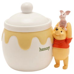 Tarro de almacenamiento de cerámica inspirado en Winnie the Pooh de Disney con efecto miel goteando y figurita de Pooh y Piglet. Mide 12x10x12 cm y combina funcionalidad y decoración.